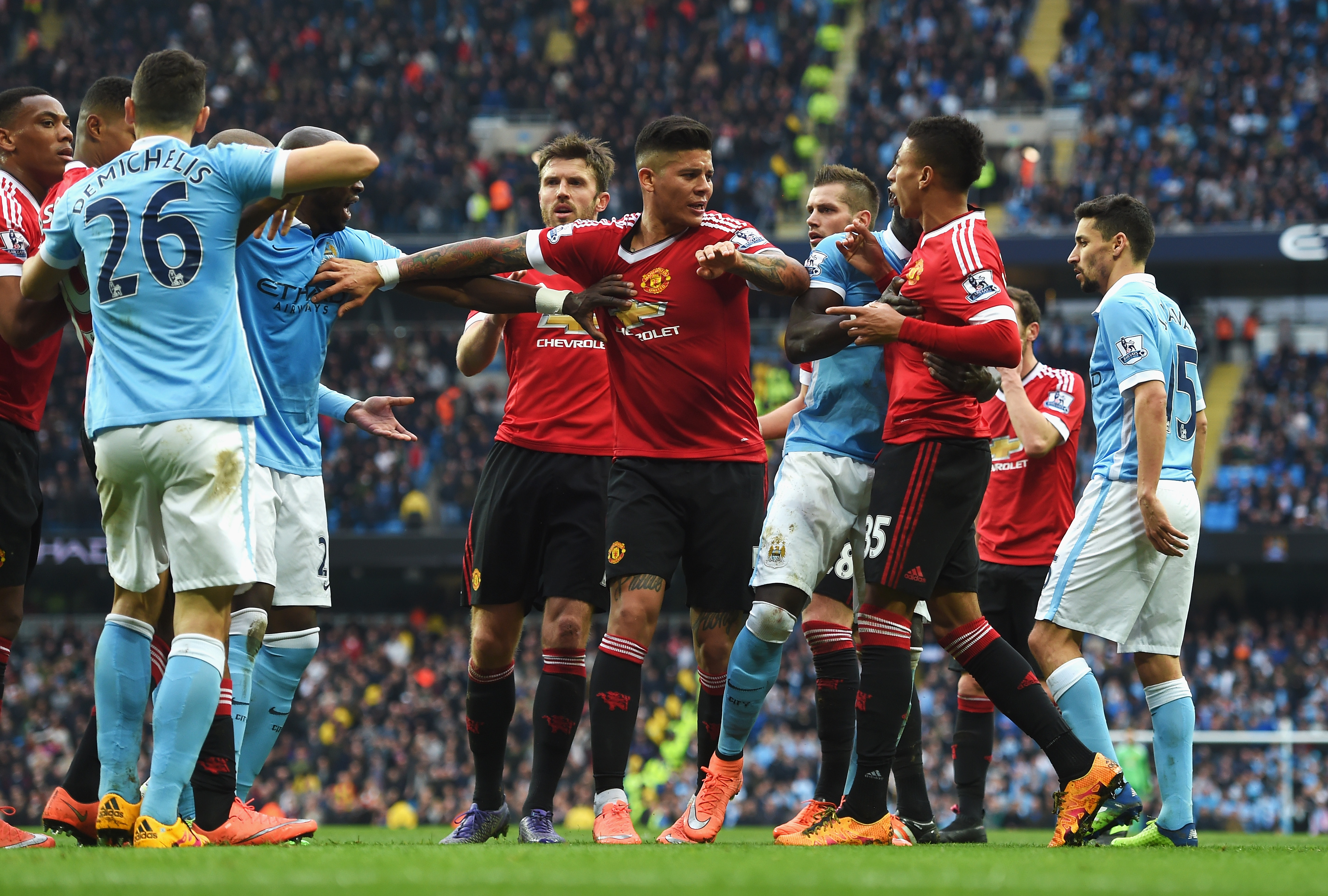 Manchester City v Manchester United - Premier League MANCHESTER, ENGLAND - MARCH 20: Players clash during the Barclays Premier League match between Manchester City and Manchester United at Etihad Stadium on March 20, 2016 in Manchester, United Kingdom. (Photo by Michael Regan/Getty Images)